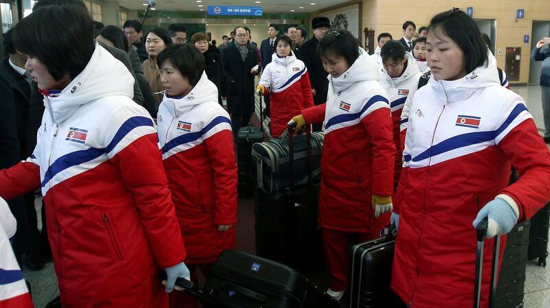 North Korean women’s ice hockey players arrive near the demilitarised zone (DMZ) on January 25th. They will play in a united Korean team at the winter Olympics.  Photograph:  Korea Pool/Getty Images