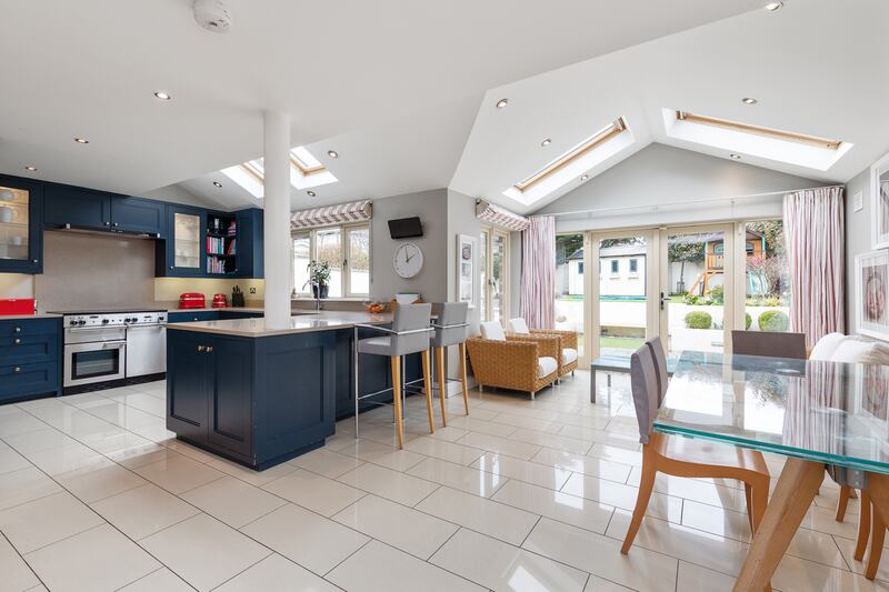 Open-plan kitchen living and dining area to the rear