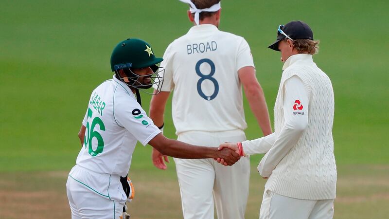 England’s Joe Root and Pakistan’s Babar Azam shake hands on a draw in Southampton. Photograph: Alastair Grant/Getty/AFP