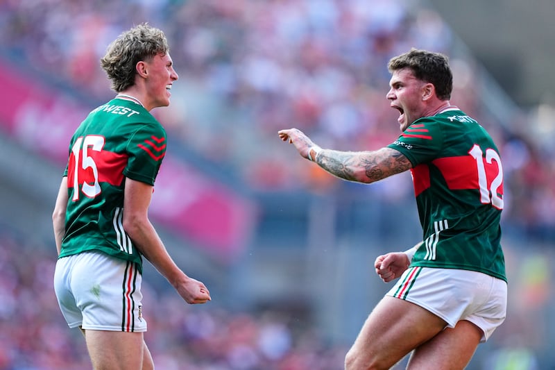 Kobe McDonald and Jordan Flynn of Mayo celebrate a score against Louth in the All-Ireland SFC semi-final at Croke Park on Saturday. Photograph: James Lawlor/Inpho