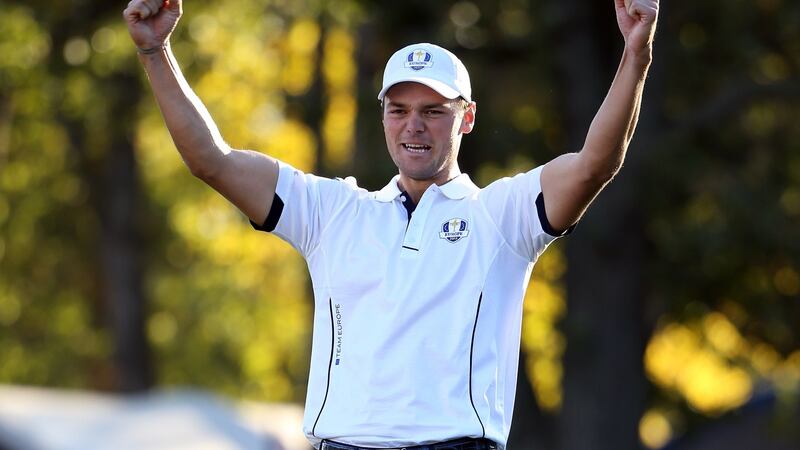 Martin Kaymer celebrates after making the putt that retained the Ryder Cup for  Europe   on the 18th green in his match against Steve Stricker at Medinah Country Club  in 2012. Photograph: Ross Kinnaird/Getty Images