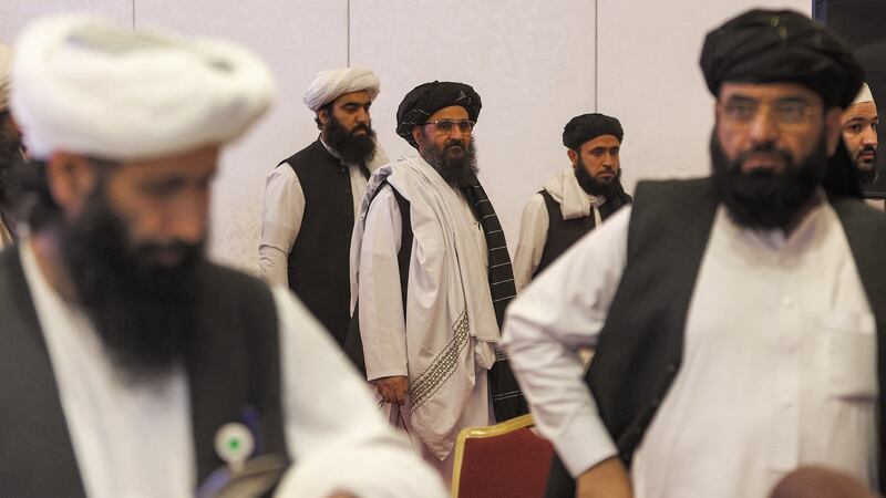 Mullah Abdul Ghani Baradar (centre)  after the final declaration of the peace talks between the Afghan government and the Taliban in Qatar’s capital Doha on July 18th. (Photograph:  Karim Jaafar/AFP via Getty Images