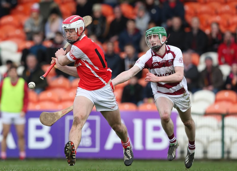 Cuala's Con O'Callaghan with Paul McNeill of Slaughtneil. Photograph: Matt Mackey/Presseye/Inpho