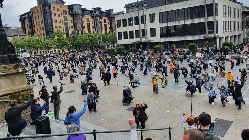 People take part in a Black Lives Matter protest rally in Custom House Square, Belfast. Photograph: Rebecca Black/PA Wire