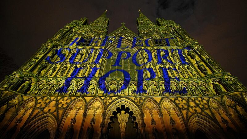 It is not enough to ‘reflect’, ‘support’ and ‘hope’, words projected on to the side of Lichfield Cathedral during last week’s National Day of Reflection. Photograph: Oli Scarff/Getty Images