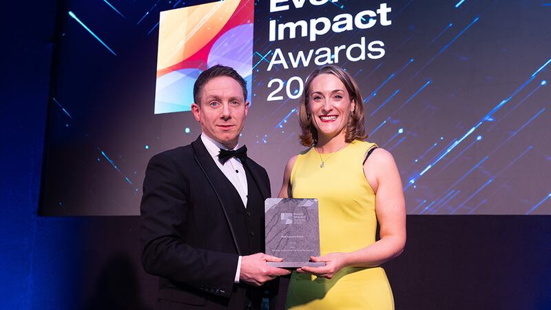 John Carty, awards judge, presents the best launch event award to Shell Holden, Fuel