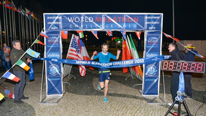 Gary Thornton finishes the Lisbon marathon.