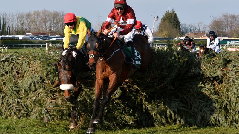 Tiger Roll and jockey  Davy Russell on the way to winning back-to-back  Grand National titles at Aintree. Photograph: Peter Powell/Reuters
