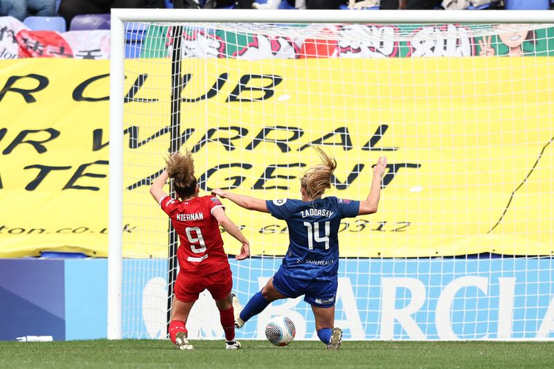 BIRKENHEAD, ENGLAND - MARCH 17: Leanne Kiernan of Liverpool scores the first goal of the game during the Barclays Women's Super League match between Liverpool FC and West Ham United at Prenton Park on March 17, 2024 in Birkenhead, England.(Photo by Gary Oakley/Getty Images)