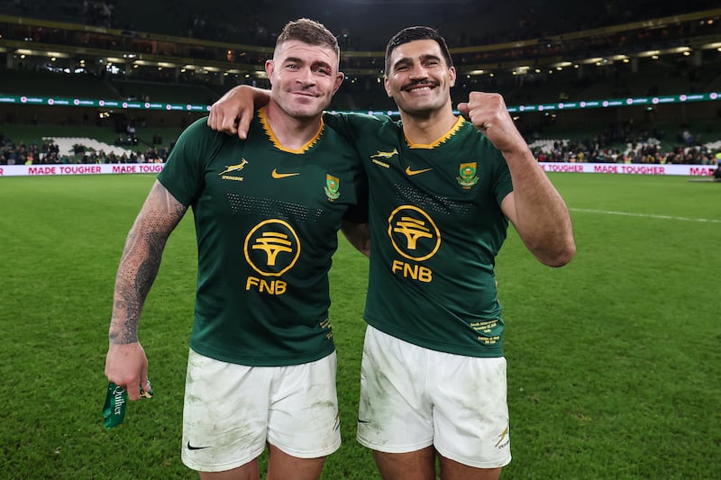  South Africa's Malcolm Marx and Damian de Allende celebrate after the match. Photograph: Gary Carr/Inpho