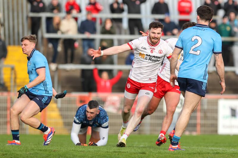 Tyrone's Rory Brennan celebrates a goal by Michael McKernan against Dublin. Photograph: Lorcan Doherty/Inpho