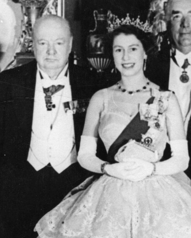 Prime minister Winston Churchill and Queen Elizabeth II attending the Commonwealth Economic Conference in Buckingham Palace.in 1952. 