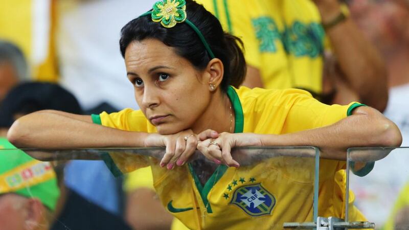A Brazil fan looks on   in Belo Horizonte. Photograph:  Martin Rose/Getty Images