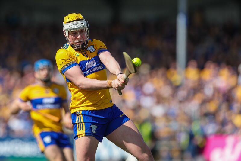 Clare's Seán Rynne scores a point against Waterford. Photograph: Natasha Barton/Inpho