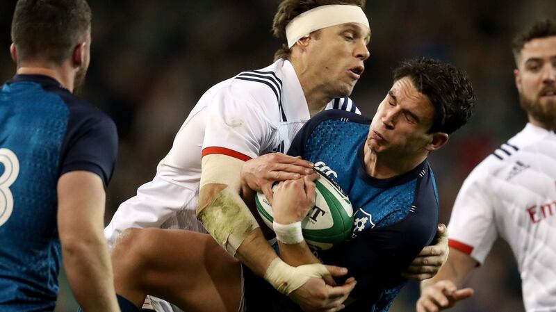 Ireland’s Joey Carbery is tackled by  Blaine Scully of the USA during the autumn international against the USA at the Aviva stadium. Photograph: Bryan Keane/Inpho