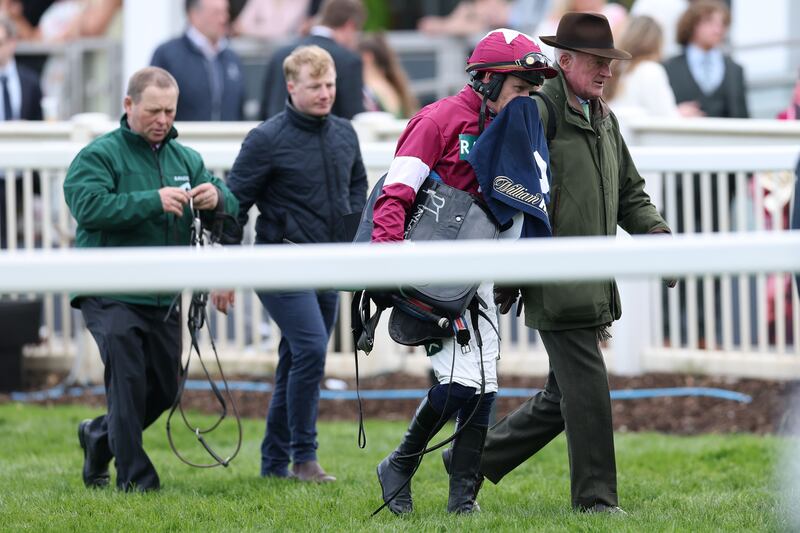 Paul Townend and trainer Willie Mullins walk from the course after Gold Dancer was euthanised due to injury following last Friday's William Hill Mildmay Novices' Chase at Aintree. Photograph: Michael Steele/Getty Images