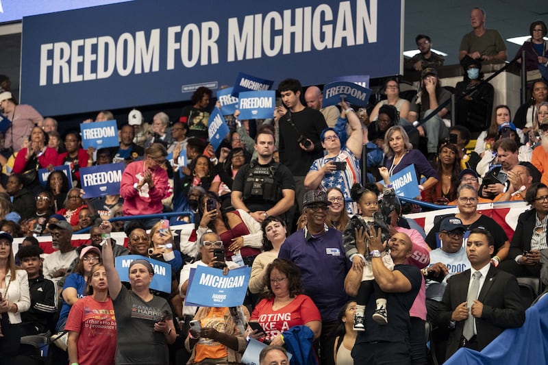 Attendees cheer as Kamala Harris speaks during a campaign event in Flint, Michigan. Photograph: Sarah Rice/Bloomberg