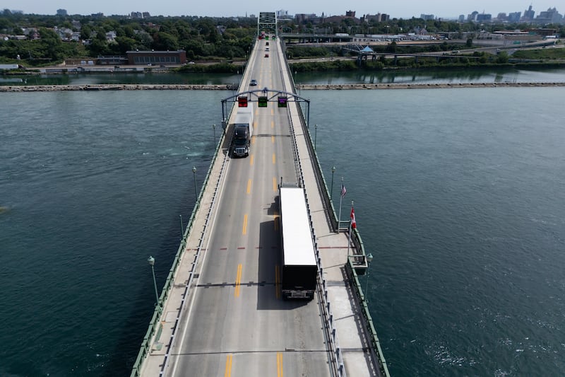 Vehicles cross the Peace Bridge at the Canada-United States border in Fort Erie, Ontario, Canada. Photograph: Cole Burston/Bloomberg