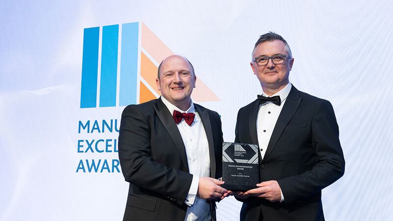 Dr Emmett Kerr, committee member at Irish Manufacturing Council, presents the digital transformation award to Sean Ward, Boston Scientific Clonmel