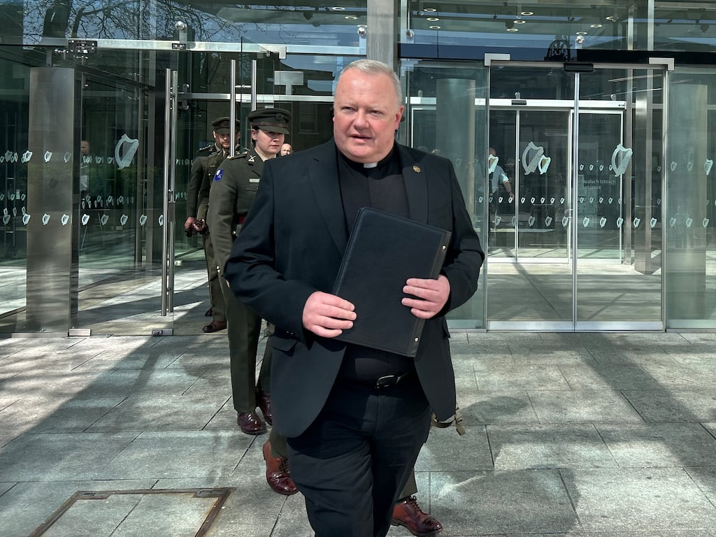 Fr Paul Murphy exits the Central Criminal Court in Dublin after giving a victim impact statement in a sentencing hearing for a boy who stabbed him. Photograph: Cillian Sherlock/PA Wire