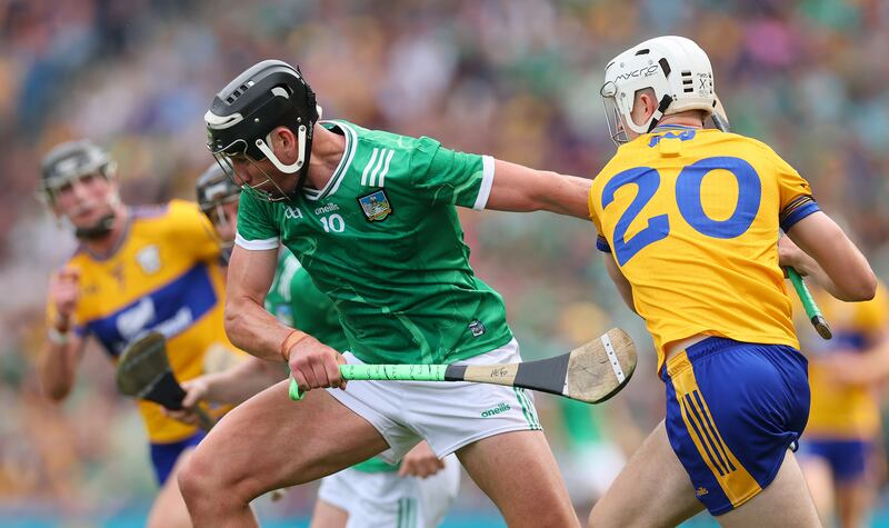 Limerick's Gearóid Hegarty and Clare's Cian Galvin. Photograph: Ryan Byrne/Inpho