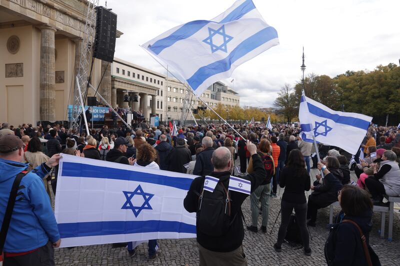 People wave Israeli flags as they attend a demonstration to show solidarity with Israel and against anti-Semitism on October 22nd, 2023 in Berlin, Germany. Photograph: Sean Gallup/Getty Images