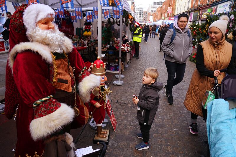 Rather than sticking to tradition, just think about what you actually enjoy doing at Christmas - showing children around the sights in town could be a good place to start. Photograph: Brian Lawless/PA