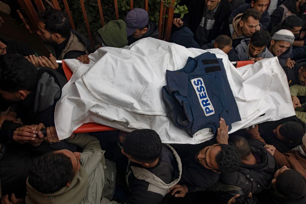 Mourners carry the body of a journalist through Nasser Hospital in Khan Yunis, southern Gaza Strip, on Wednesday. Photograph: Haitham Imad/EPA