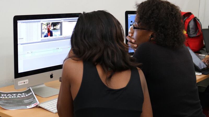 Trainees work at Media Lab in Maputo. Photograph: Louise McLoughlin