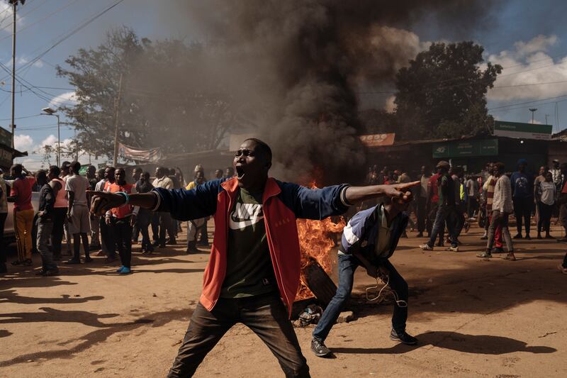 
Demonstrators protest the high cost of living in Kibera, a neighborhood of Nairobi, the capital of Kenya, in March. Photograph: Hannah Reyes Morales/New York Times
                      