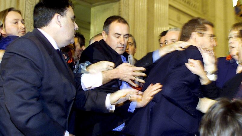 This division between the pacified bourgeois intellect and the hysterical and excessive was exemplified in 2001, when the David Trimble calmly gave a press conference as other members of the Assembly fought each other. File photograph: Peter Morrison/AP Photo