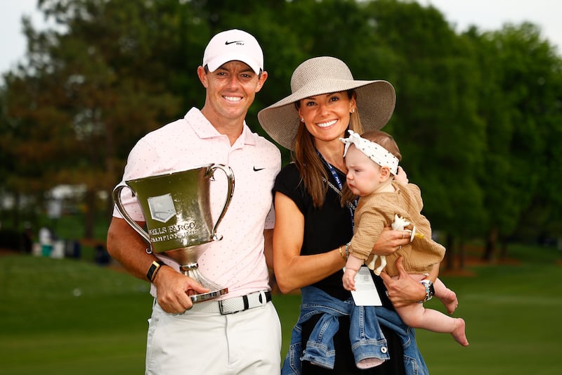 Rory McIlroy celebrates alongside his wife Erica and daughter Poppy after winning the 2021 Wells Fargo Championship at Quail Hollow on May 9th, 2021 in Charlotte, North Carolina. Photograph: Jared C Tilton/Getty Images