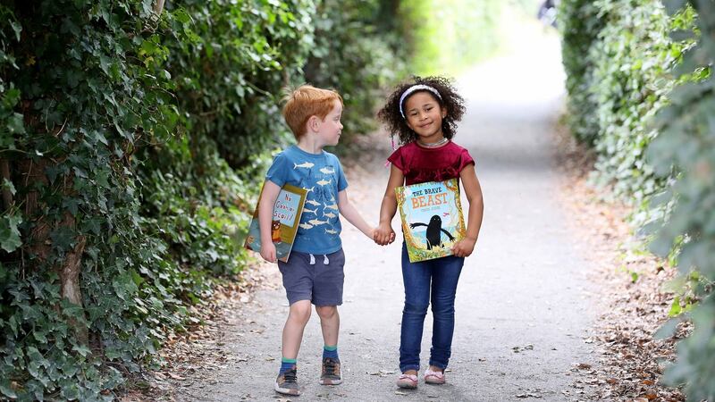 Claire Letso (5) and Sam McNally (5) getting in the mood for the inaugural Dubray StoryFest family book festival which will take place at Airfield Estate, Dundrum. Photograph: Mark Stedman