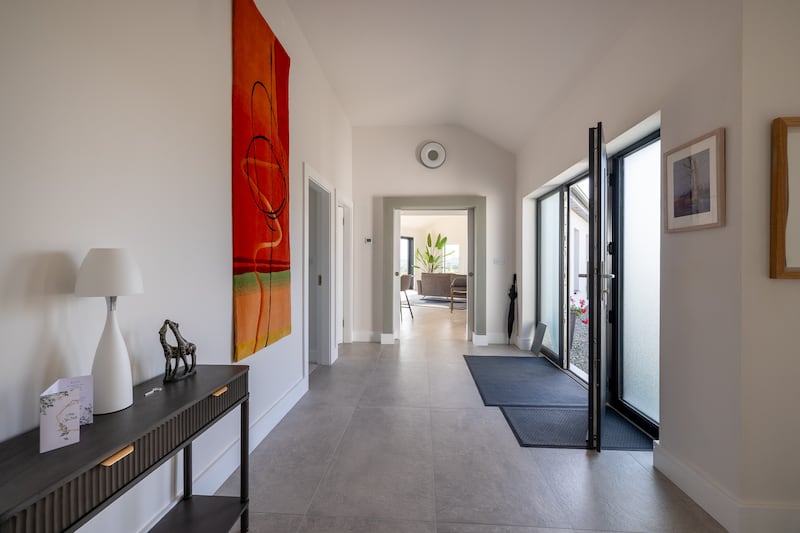 All rooms lie off an expansive hallway