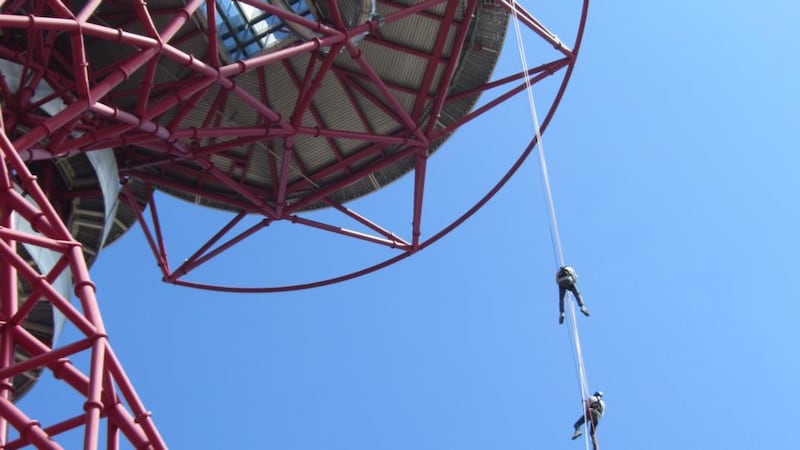 There are now two ways to descend the ArecelorMitttal Orbit – by giant slide or by abseiling.