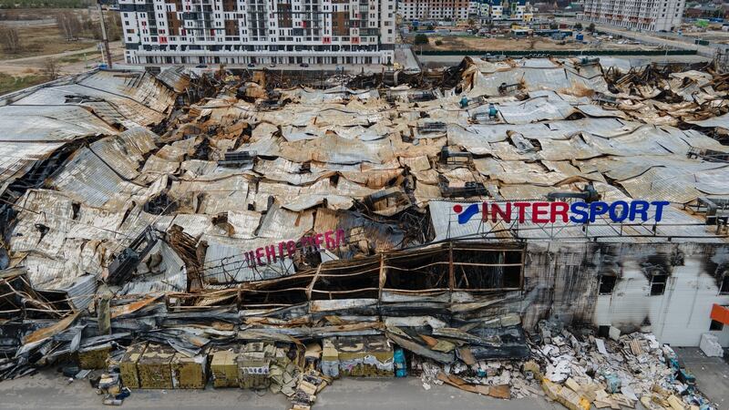The ruins of a destroyed shopping centre in Bucha. Photograph: Alexey Furman/Getty Images