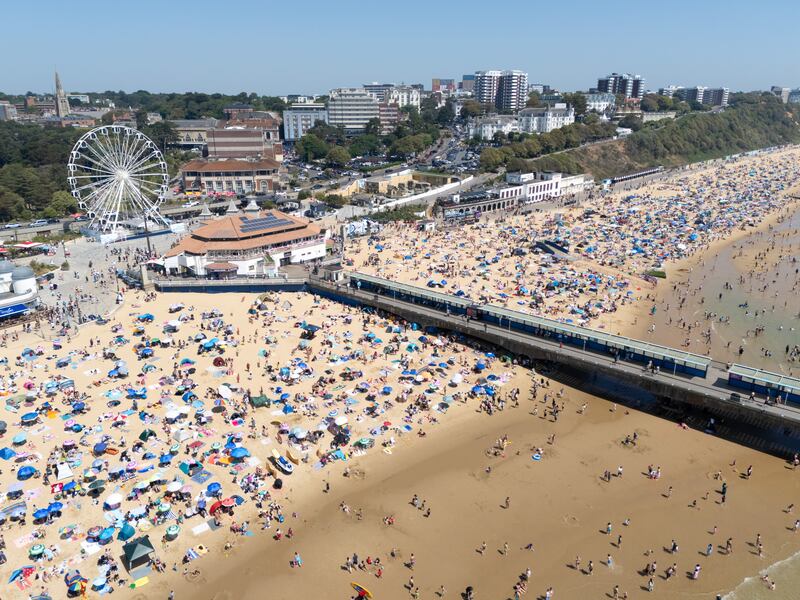 Thousands descended on Bournemouth beach on Monday as a heatwave brought record-breaking weather to England. Photograph: Finnbarr Webster/Getty Images