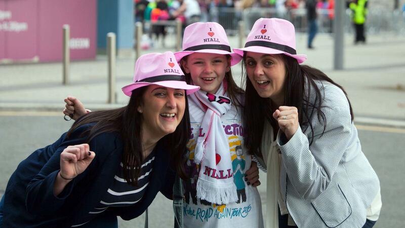One Direction fans Nicole Cullen (centre) with her aunt Catriona Neville (left) and  mother Bridget Cullen, all from Wexford, ahead of the boyband’s show at 3Arena in Dublin, October 16th, 2015.  Photograph: Gareth Chaney Collins