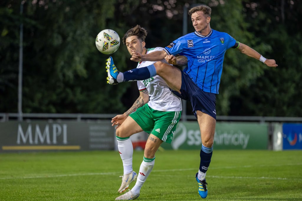 UCD veteran Ronan Finn in action against Ruairí Keating of Cork City. Photograph: Morgan Treacy/Inpho