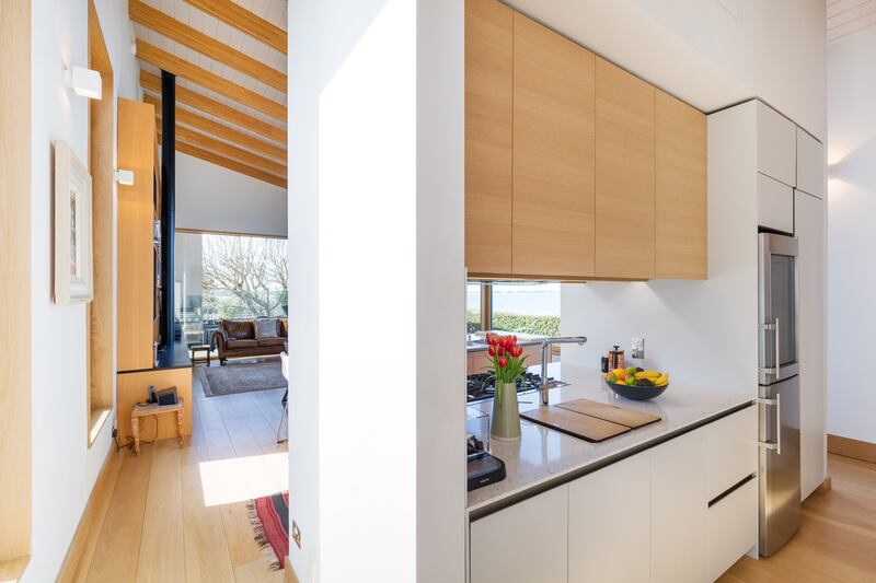 Kitchen with pantry fridge, wine cooler, Britannia six-ring gas hob