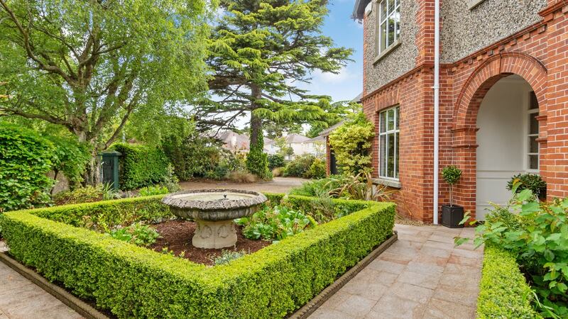 Front garden with fountain.