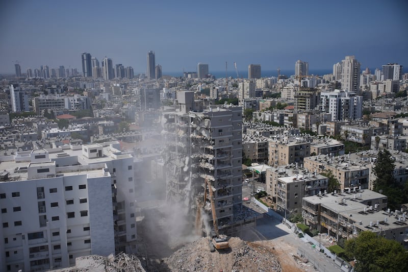 A building struck by an Iranian missile last month is demolished in Bat Yam, south of Tel Aviv. Photograph: Ohad Zwigenberg/AP