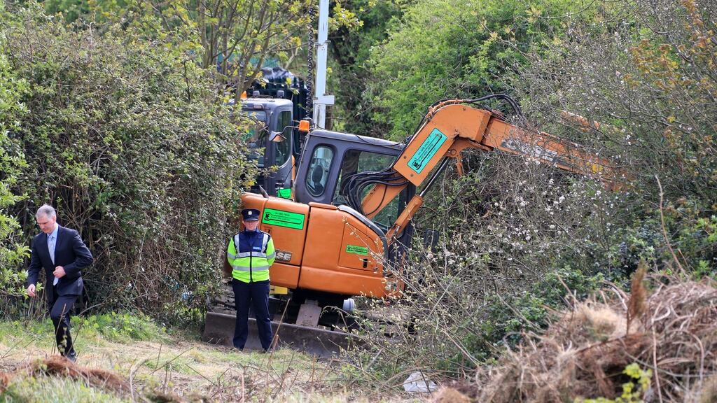 Gardai at the scene in Tolka Valley Park, Finglas. Photograph: Collins.