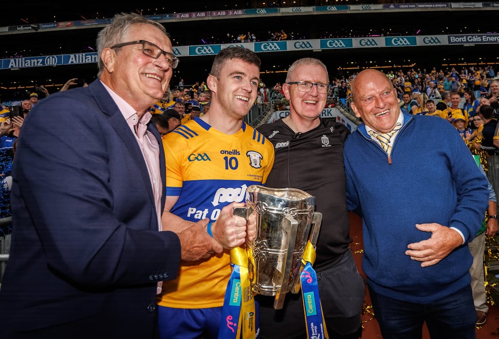 Former Clare managers Tony Considine and Ger Loughnane celebrate with Tony Kelly and manager Brian Lohan at Croke Park after the victory over Cork in the All-Ireland SHC final. Photograph: James Crombie/Inpho