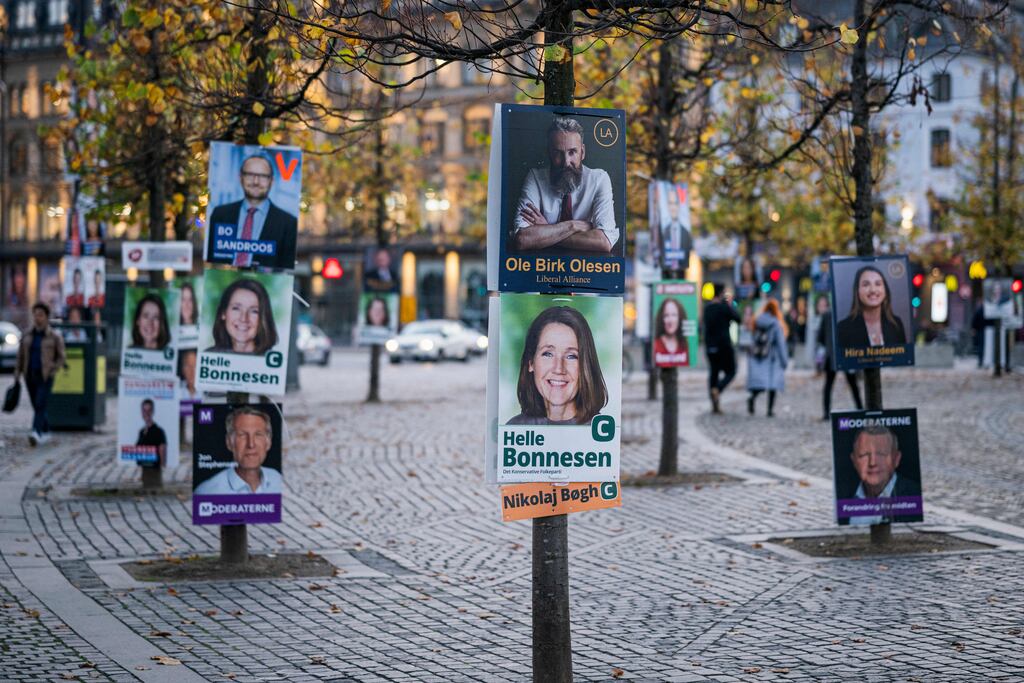 Election campaign posters with various candidates are seen in Copenhagen, Denmark, on October 31, 2022, on the eve of the general elections on November 1, 2022. (Photo by Jonathan Nackstrand / AFP)