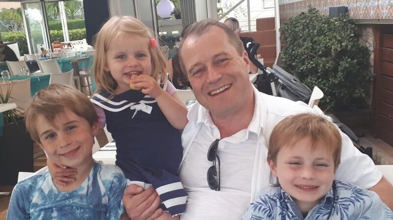 Conor (9), Darragh (7) and Carla (3) McGinley with their father Andrew McGinley.