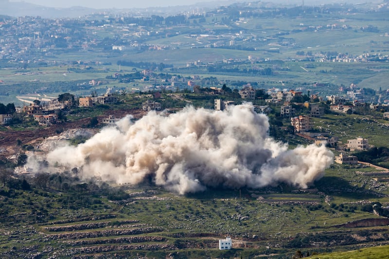 Smoke rising as the Israeli army demolishes buildings and homes in southern Lebanon on Monday. Photograph: Jalaa Marey/AFP via Getty Images