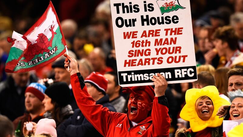 A Wales fan enjoys the pre match atmosphere during the RBS Six Nations match between Wales and France at the Principality Stadium in Cardiff, Wales. Photograph:  Stu Forster/Getty Images