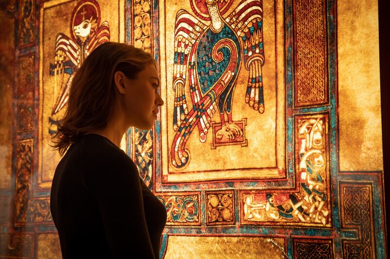 A visitor at Trinity College Dublin's Book of Kells Experience. Photograph: Barry McCall