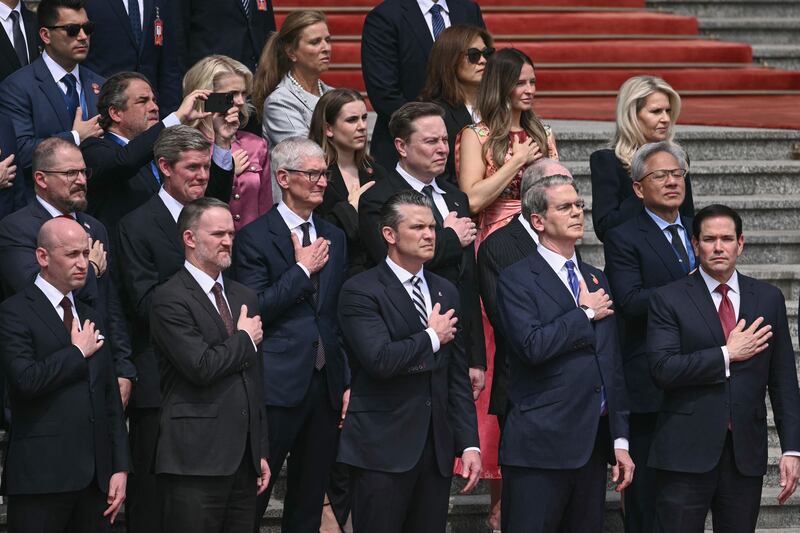 American chief executives and senior members of the US government accompanied Donald Trump on his trip to Beijing. Photograph: Brendan Smialowski/AFP via Getty Images